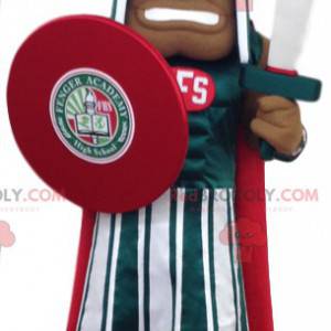 Roman soldier mascot in red and green official dress -