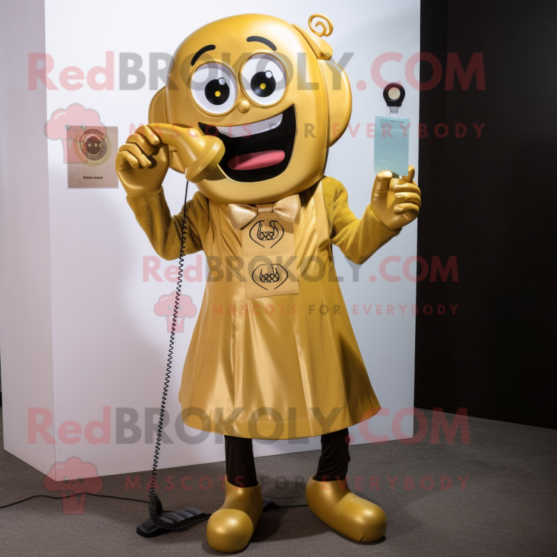 Gold Phone mascot costume character dressed with a A-Line Skirt and Suspenders Gold Phone mascot costume character dressed with a A-Line Skirt and Suspenders
