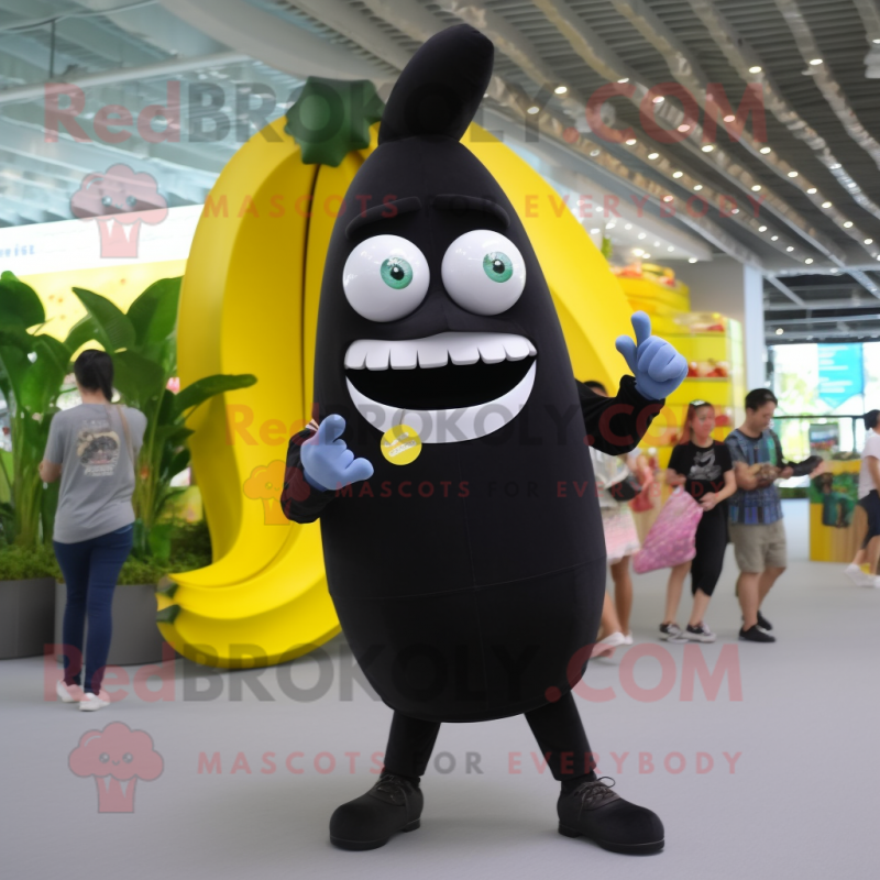 Black Banana mascot costume character dressed with a Skinny Jeans and Coin purses