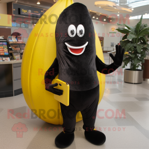 Black Banana mascot costume character dressed with a Skinny Jeans and Coin purses