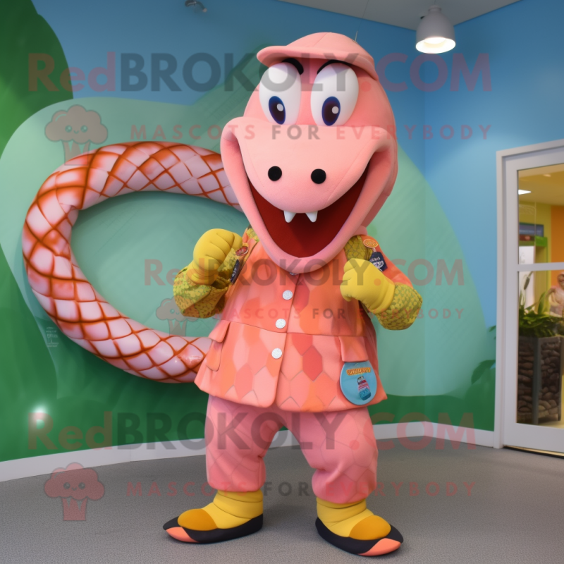 Peach Python mascot costume character dressed with a Bermuda Shorts and Rings Peach Python mascot costume character dressed with a Bermuda Shorts and Rings