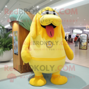 Lemon Yellow Walrus mascot costume character dressed with a Shorts and Keychains