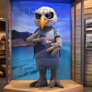 Gray Bald Eagle mascot costume character dressed with a Swimwear and Eyeglasses