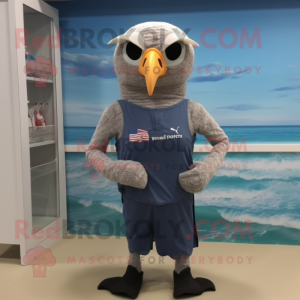 Gray Bald Eagle mascot costume character dressed with a Swimwear and Eyeglasses