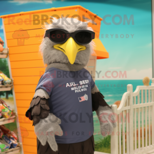 Gray Bald Eagle mascot costume character dressed with a Swimwear and Eyeglasses