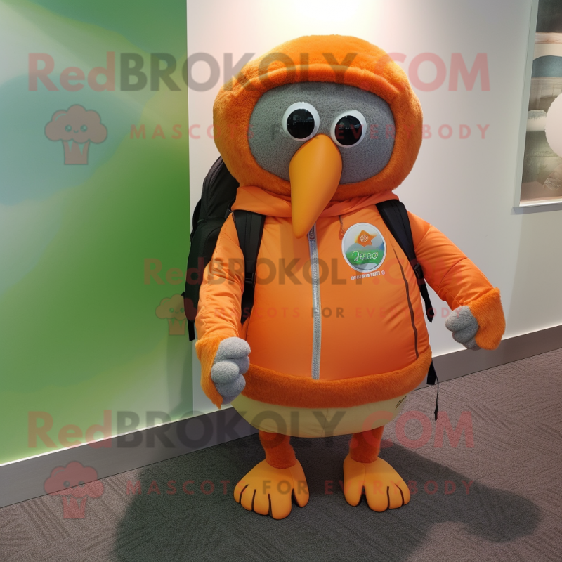 Orange Kiwi mascot costume character dressed with a Cover-up and Backpacks