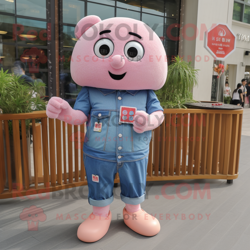 Pink Dim Sum mascot costume character dressed with a Denim Shirt and Smartwatches