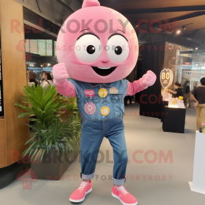 Pink Dim Sum mascot costume character dressed with a Denim Shirt and Smartwatches