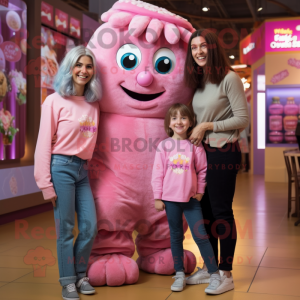 Pink Chocolates mascot costume character dressed with a Mom Jeans and Hair clips