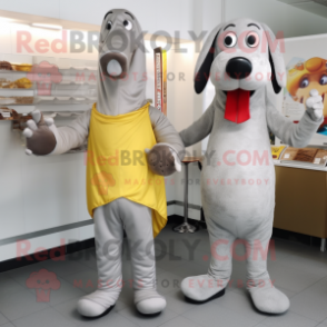 Silver Hot Dogs mascot costume character dressed with a Jumpsuit and Brooches