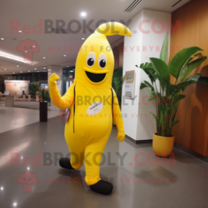 Yellow Banana mascot costume character dressed with a Jumpsuit and Messenger bags