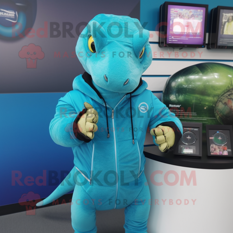 Turquoise Komodo Dragon mascot costume character dressed with a Hoodie and Smartwatches