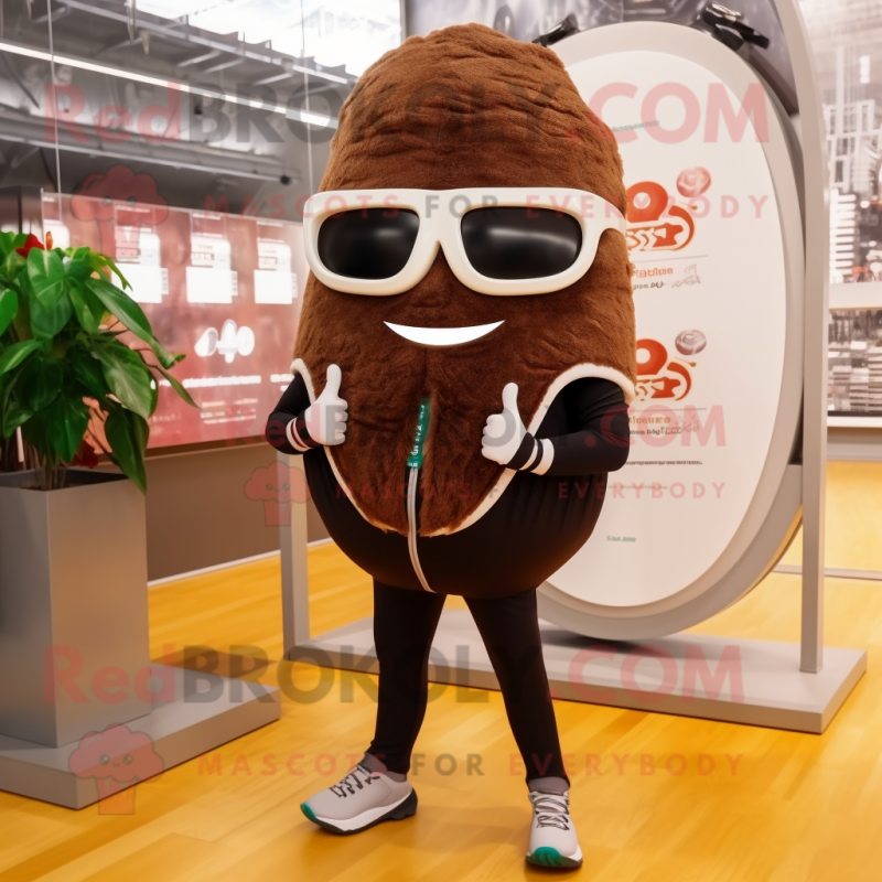 Brown Onion mascot costume character dressed with a Yoga Pants and Sunglasses