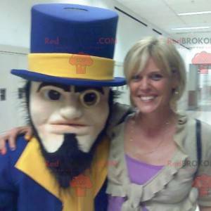 Bearded man mascot dressed in a blue and yellow suit -