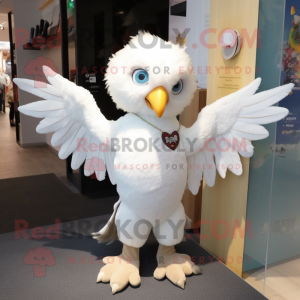 White Harpy mascot costume character dressed with a Bootcut Jeans and Brooches