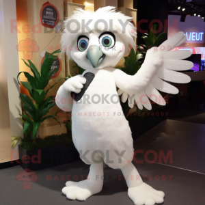 White Harpy mascot costume character dressed with a Bootcut Jeans and Brooches