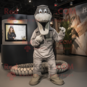 Gray Python mascot costume character dressed with a Corduroy Pants and Watches