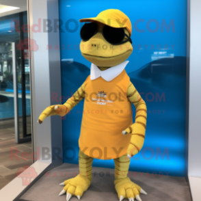 Gold Lizard mascot costume character dressed with a Swimwear and Sunglasses