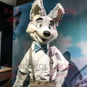 Silver Dingo mascot costume character dressed with a Button-Up Shirt and Bow ties