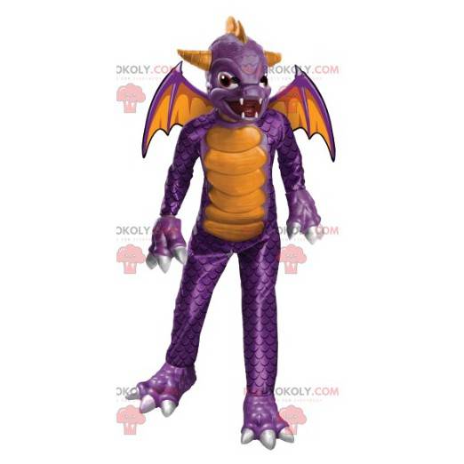 Mascotte de diable violet et jaune très menaçant -