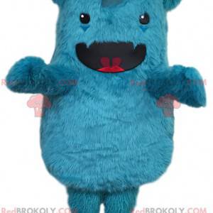 Mascotte de petit monstre bleu fantastique poilu -