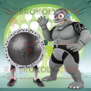 Gray Frankenstein'S Monster mascot costume character dressed with a One-Piece Swimsuit and Rings