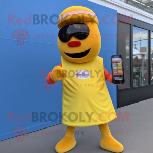 Gold Hot Dog mascot costume character dressed with a Rash Guard and Smartwatches