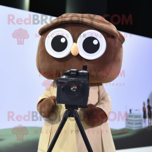 Brown Camera mascot costume character dressed with a Blouse and Eyeglasses