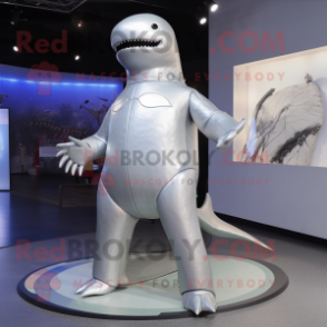 Silver Whale mascot costume character dressed with a Rash Guard and Foot pads