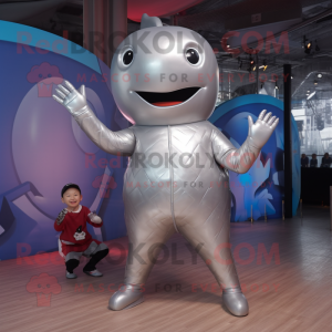 Silver Whale mascot costume character dressed with a Rash Guard and Foot pads