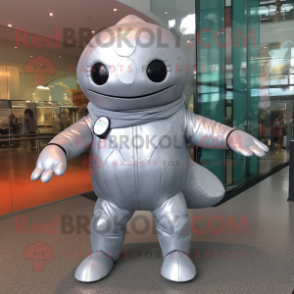 Silver Whale mascot costume character dressed with a Rash Guard and Foot pads