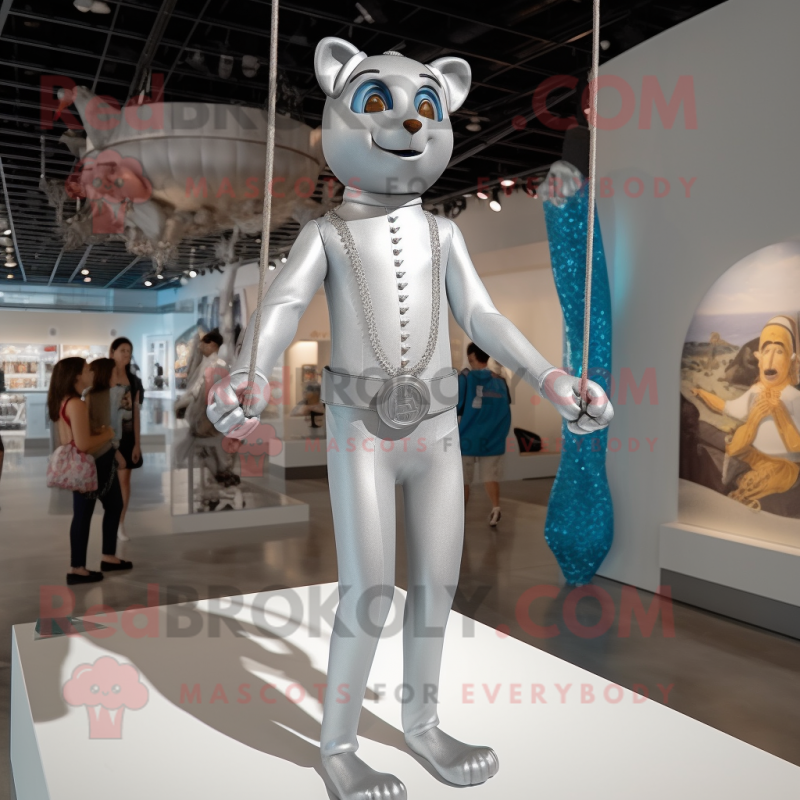 Silver Trapeze Artist mascot costume character dressed with a Jumpsuit and Earrings Silver Trapeze Artist mascot costume character dressed with a Jumpsuit and Earrings