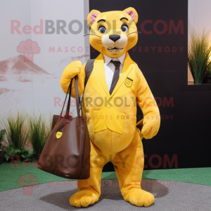 Yellow Jaguarundi mascot costume character dressed with a Suit and Tote bags