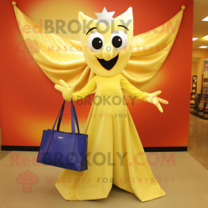 Gold Ray mascot costume character dressed with a Evening Gown and Tote bags