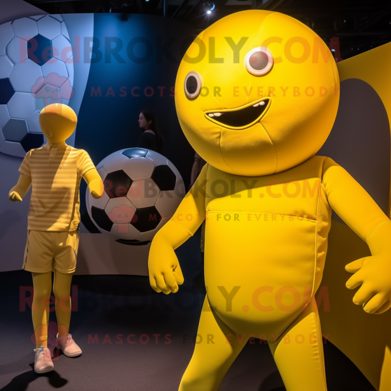 Yellow Soccer Ball mascot costume character dressed with a Playsuit and Ties Yellow Soccer Ball mascot costume character dressed with a Playsuit and Ties