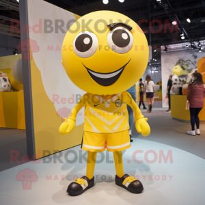 Yellow Soccer Ball mascot costume character dressed with a Playsuit and Ties
