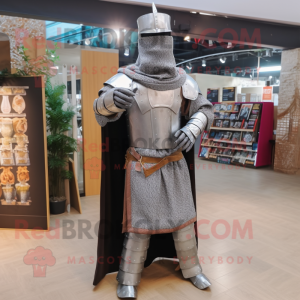 Silver Medieval Knight mascot costume character dressed with a Flannel Shirt and Shawls