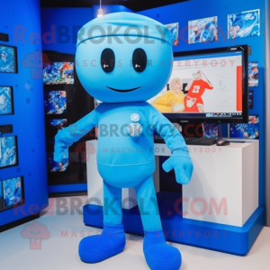 Blue Computer mascot costume character dressed with a Shorts and Lapel pins