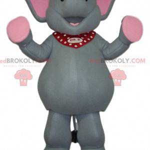 Mascota elefante gris y rosa muy feliz - Redbrokoly.com