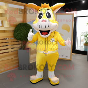 Lemon Yellow Jersey Cow mascot costume character dressed with a Chinos and Hairpins