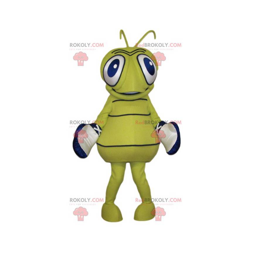 Mascote de vespa amarela com grandes olhos azuis -