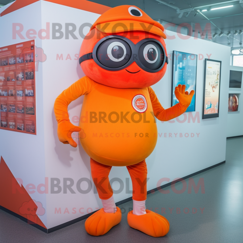 Orange Cyclops mascot costume character dressed with a Leggings and Berets Orange Cyclops mascot costume character dressed with a Leggings and Berets