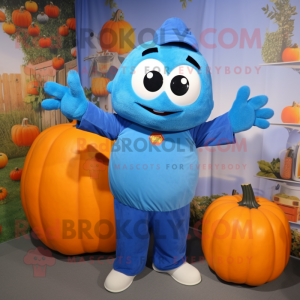 Blue Pumpkin mascot costume character dressed with a Overalls and Mittens