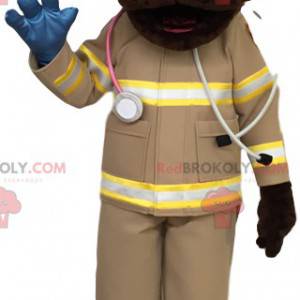 Brązowy labrador maskotka w stroju pierwszej pomocy -