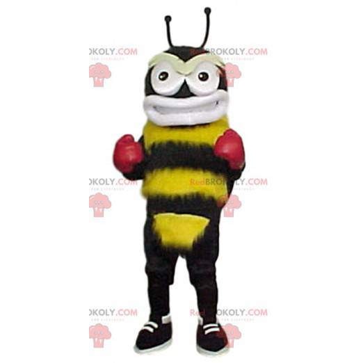 Mascotte calabrone giallo e nero con guantoni da boxe -