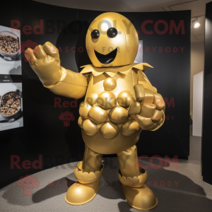 Gold Human Cannon Ball mascot costume character dressed with a Playsuit and Shoe clips