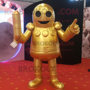Gold Human Cannon Ball mascot costume character dressed with a Playsuit and Shoe clips