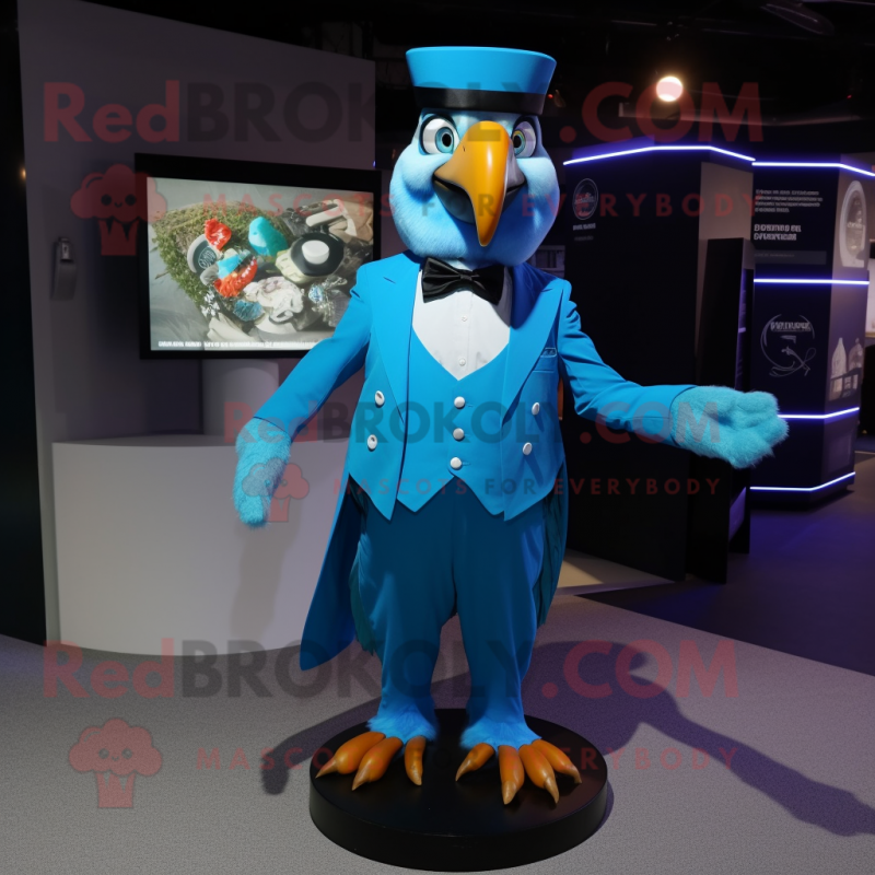 Cyan Macaw mascot costume character dressed with a Tuxedo and Rings