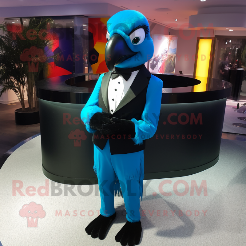 Cyan Macaw mascot costume character dressed with a Tuxedo and Rings