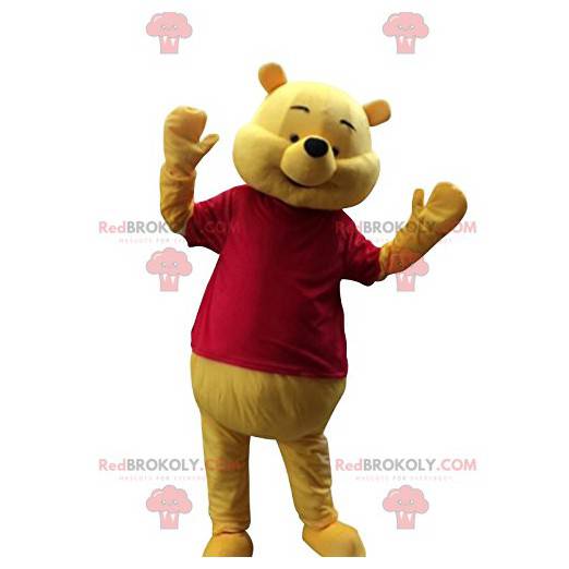 Winnie the Pooh mascot happy with his red t-shirt -